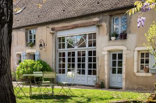 Foto: Haus und Garten mit Sitzgruppe
